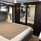 Boasting a king size bed, the 3202WB bedroom does not disappoint. Equipped with a strut assisted platform for underbed storage, outlets on each side of the bed, overhead cabinets perfect for cpap machines, and slide out windows for cross ventilation.